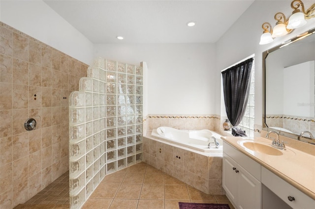 bathroom featuring vanity, shower with separate bathtub, and tile patterned flooring