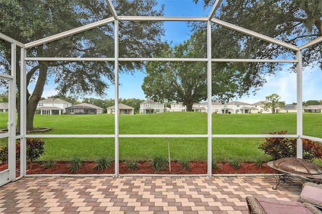 unfurnished sunroom with plenty of natural light