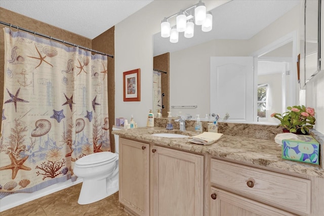 bathroom featuring an inviting chandelier, tile patterned flooring, vanity, toilet, and a textured ceiling