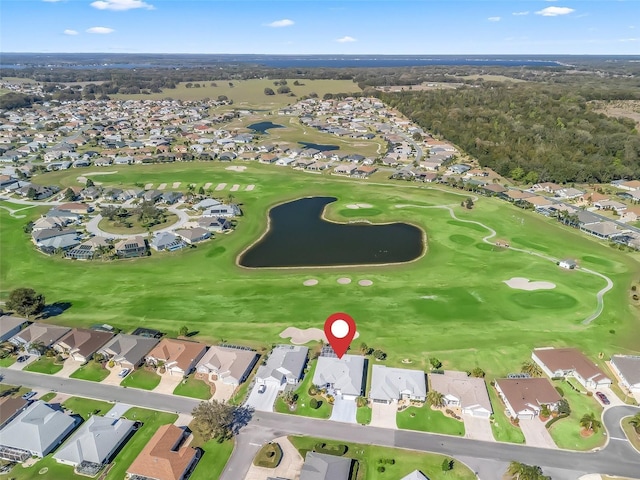 aerial view featuring view of golf course and a residential view