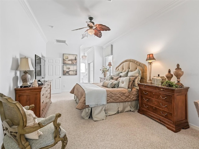 bedroom featuring crown molding, light colored carpet, visible vents, a ceiling fan, and baseboards