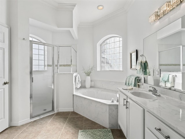 bathroom with a stall shower, plenty of natural light, vanity, and a bath