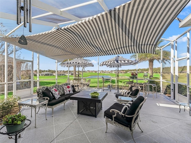 view of patio / terrace featuring golf course view and an outdoor living space