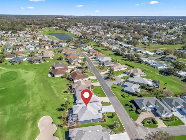 bird's eye view featuring a residential view, a water view, and golf course view