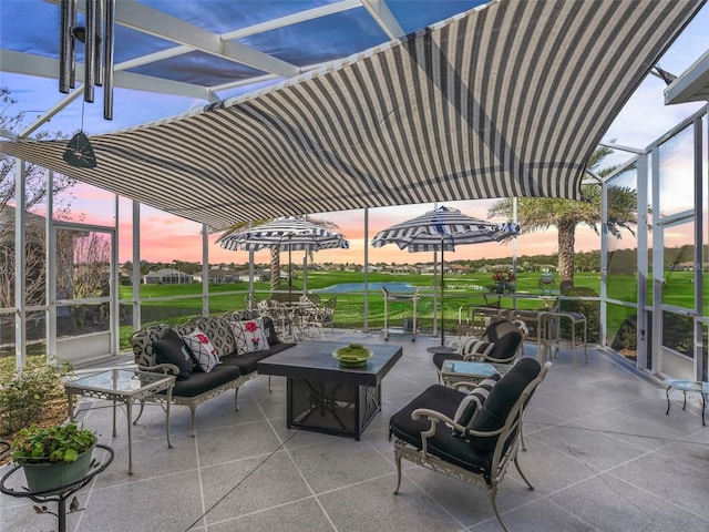 patio terrace at dusk with outdoor lounge area