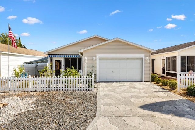 ranch-style home featuring a garage