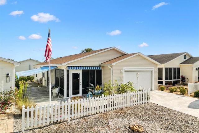 single story home featuring a garage