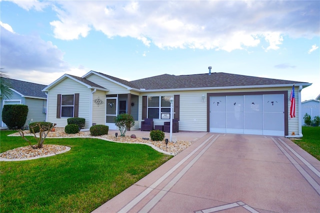 single story home with a garage and a front yard