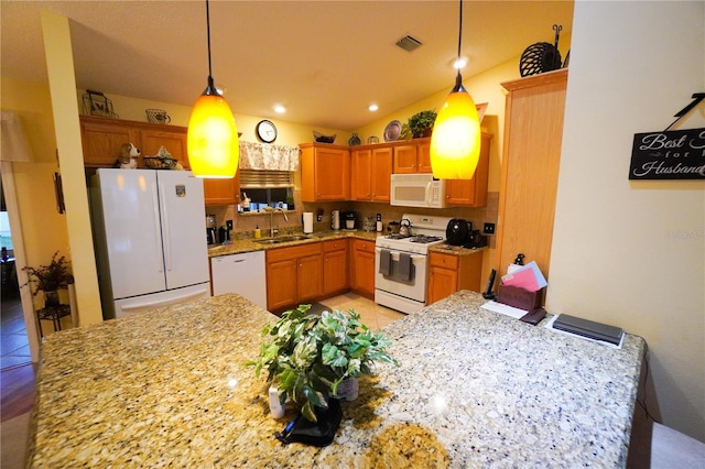 kitchen featuring sink, light stone counters, decorative light fixtures, light tile patterned floors, and white appliances