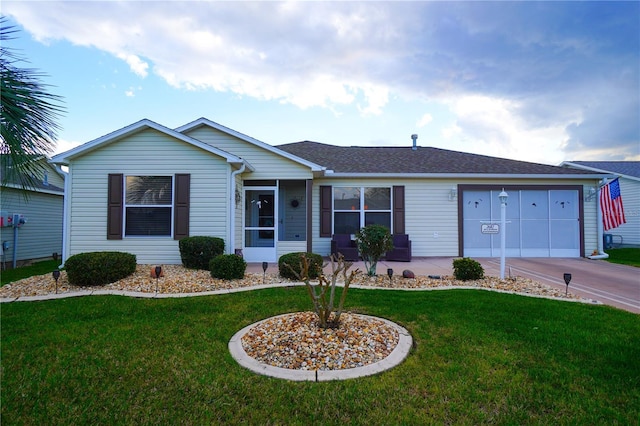 ranch-style house with a garage and a front yard