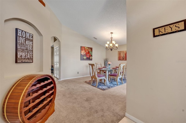 4078 Waltham Forest Dr, Tavares, FL 32778 - dining space featuring lofted ceiling, an inviting chandelier, a textured ceiling, and carpet flooring