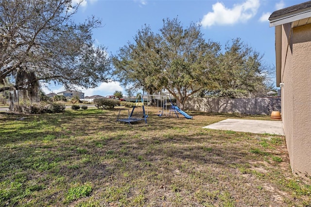 4078 Waltham Forest Dr, Tavares, FL 32778 - view of yard with a playground and a patio area