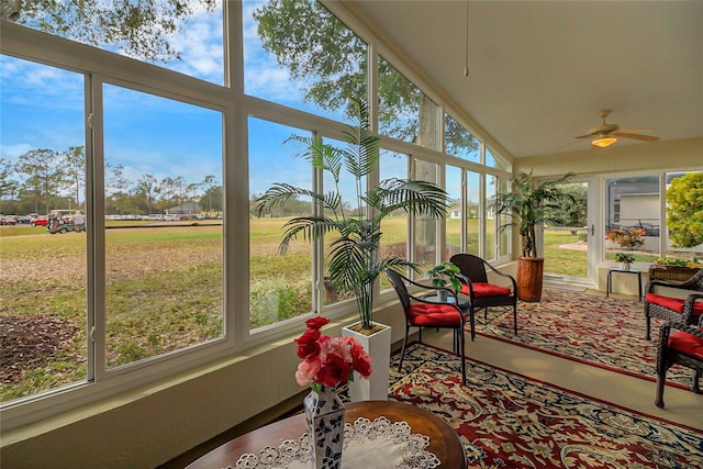 sunroom / solarium with ceiling fan