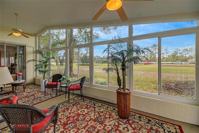 sunroom featuring ceiling fan