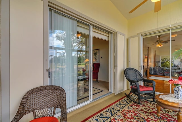 sunroom / solarium with ceiling fan