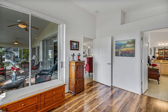 interior space with lofted ceiling and light wood-type flooring