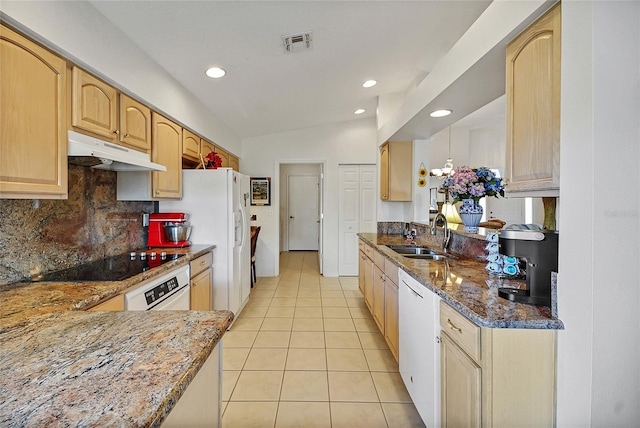 kitchen featuring sink, tasteful backsplash, light brown cabinets, stone counters, and white appliances