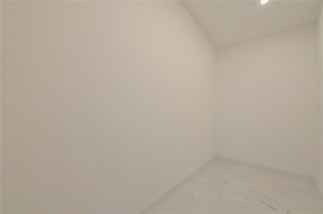 interior space with recessed lighting and baseboards