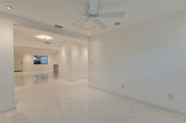 spare room with recessed lighting, baseboards, marble finish floor, and a ceiling fan