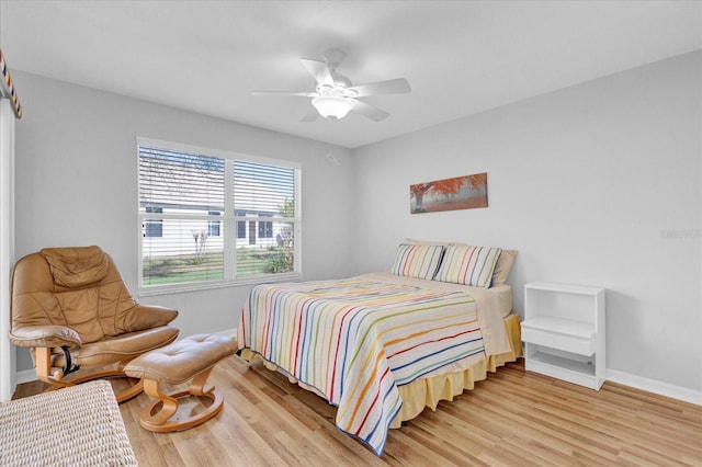 bedroom featuring ceiling fan and light wood-type flooring