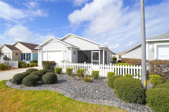 view of front of property with a garage