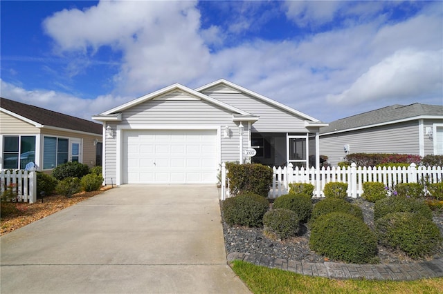 ranch-style house featuring a garage