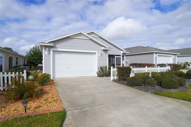 single story home with a garage