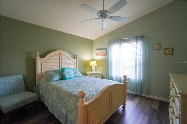 bedroom featuring ceiling fan, dark hardwood / wood-style flooring, and vaulted ceiling