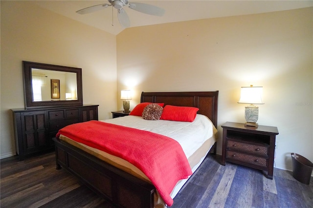 bedroom featuring ceiling fan, lofted ceiling, and dark hardwood / wood-style flooring