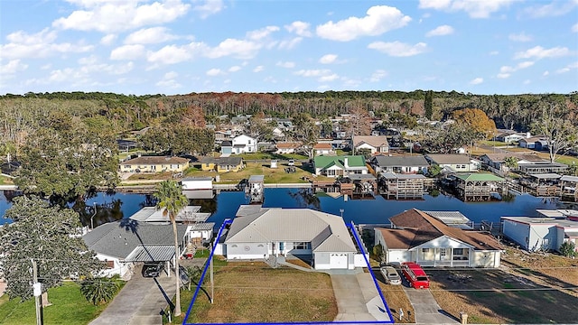 aerial view with a residential view and a water view