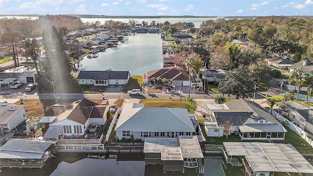 bird's eye view featuring a residential view and a water view