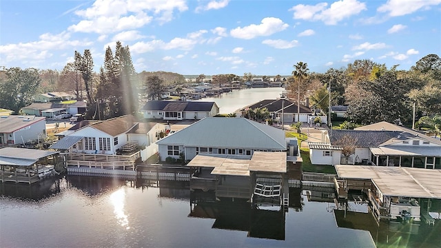 aerial view featuring a water view and a residential view