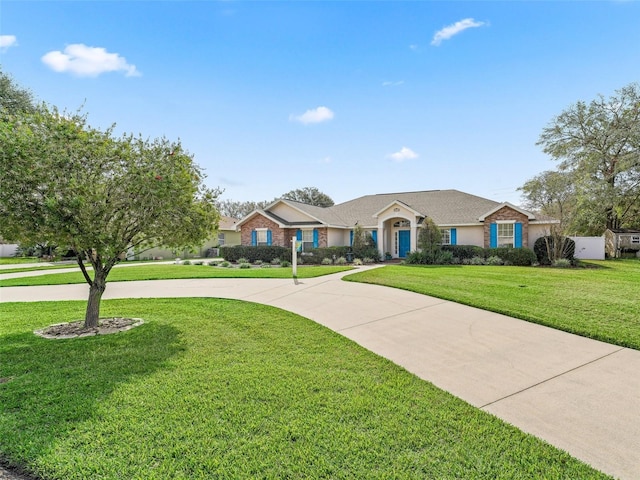 ranch-style home featuring a front yard