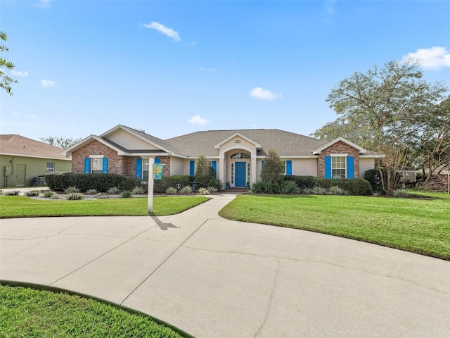 ranch-style house with a front lawn