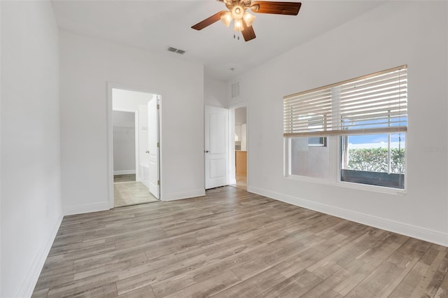 unfurnished bedroom featuring ceiling fan and light hardwood / wood-style flooring