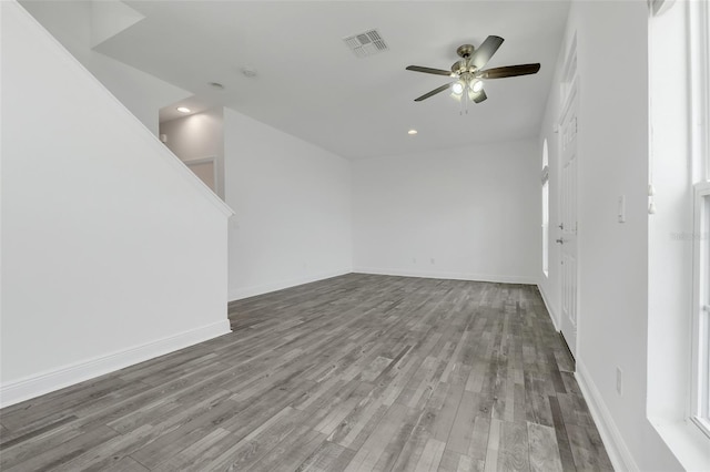 empty room featuring wood-type flooring and ceiling fan