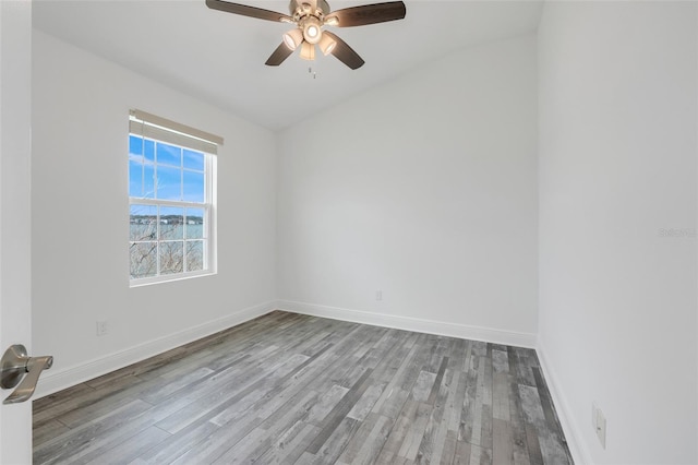 spare room with ceiling fan and light hardwood / wood-style floors