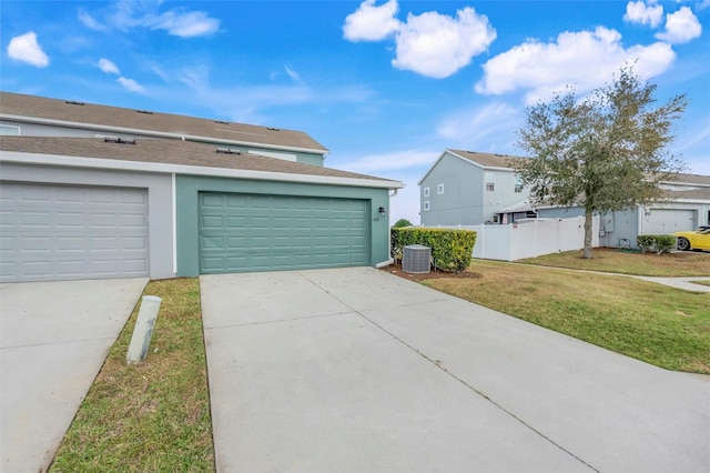 garage with a yard