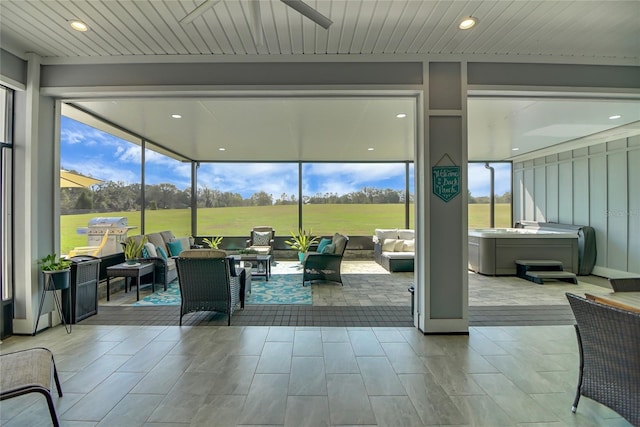 sunroom / solarium with wood ceiling