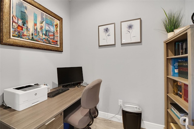 home office featuring light hardwood / wood-style floors