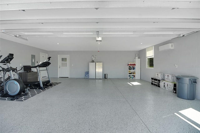 garage featuring a garage door opener, stainless steel fridge, electric panel, and a wall mounted AC