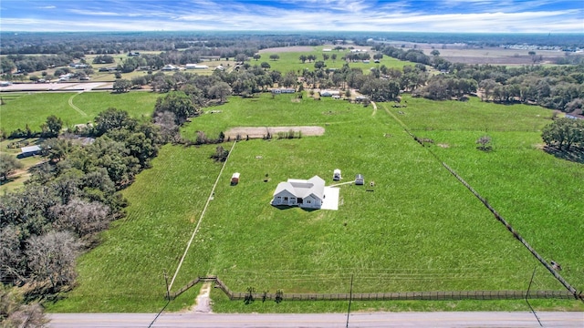 birds eye view of property featuring a rural view