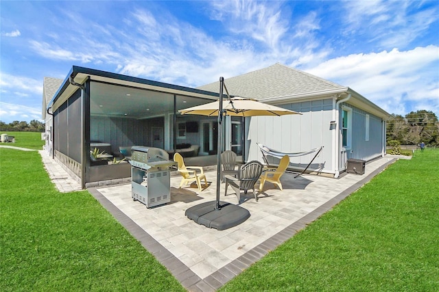 back of property featuring a patio and a yard