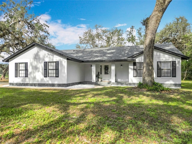 single story home with a front yard