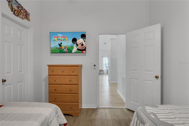 bedroom with light hardwood / wood-style flooring