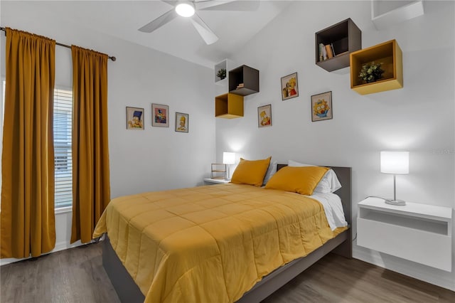 bedroom featuring hardwood / wood-style flooring and ceiling fan