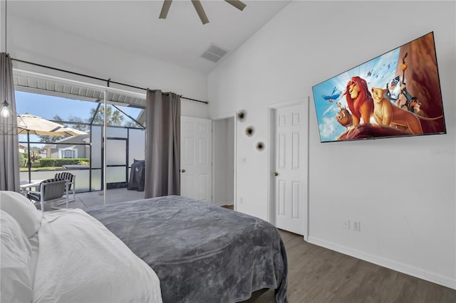 bedroom with hardwood / wood-style flooring, high vaulted ceiling, access to outside, and ceiling fan