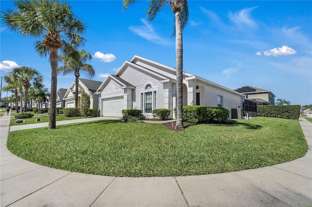 ranch-style home featuring central air condition unit, a front lawn, and a garage