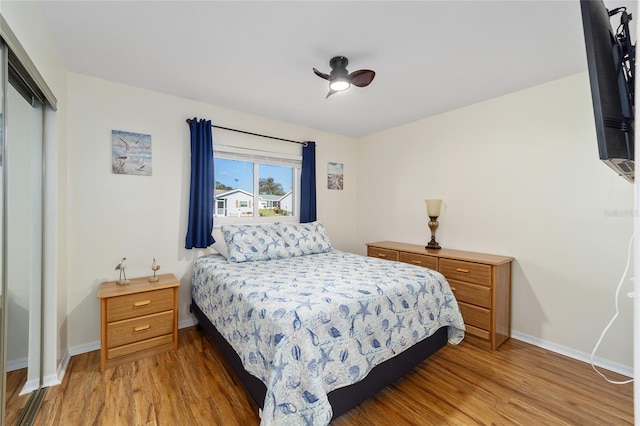 bedroom featuring hardwood / wood-style flooring and a closet