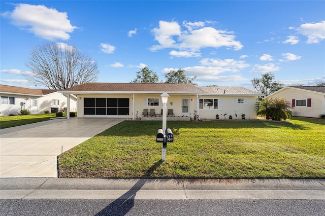 ranch-style house with a front lawn